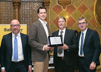 Husar (second left) and Luca Bonadiman, district manager Bobcat Italy, Greece, Cyprus with the award.